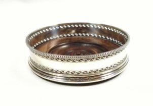 George III silver wine bottle coaster with 2 bands of pierced and bright cut decoration, beaded rim,