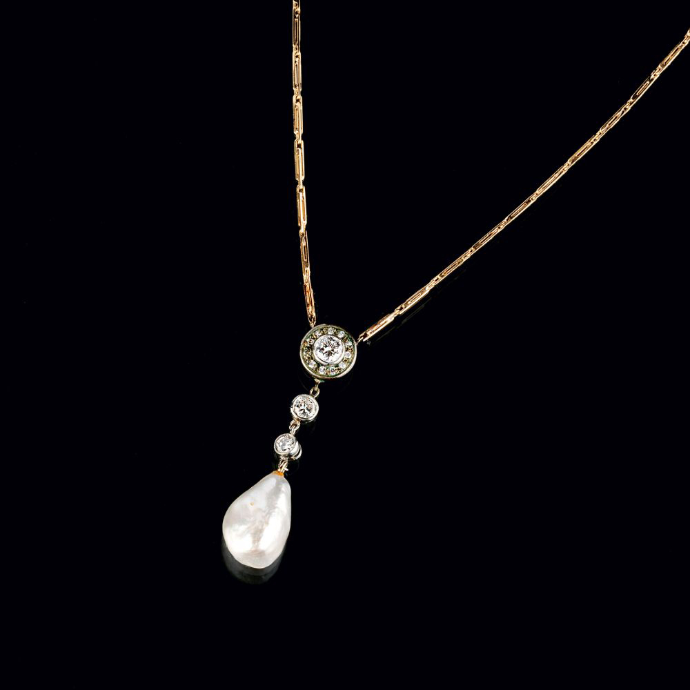 An Art Nouveau Diamond Pearl Pendant.