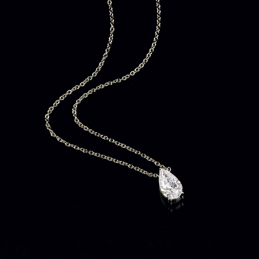 A Solitaire Pear Diamond Pendant on Necklace.