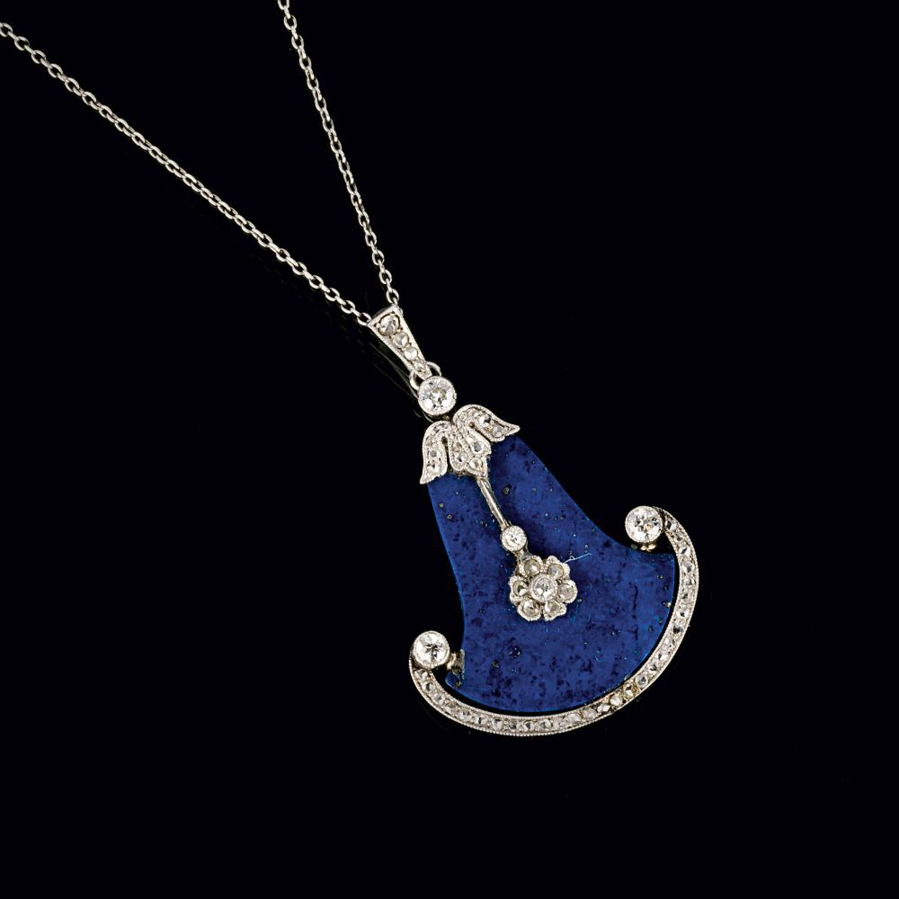 An Art-déco Lapis Lazuli Diamond Pendant on Necklace.