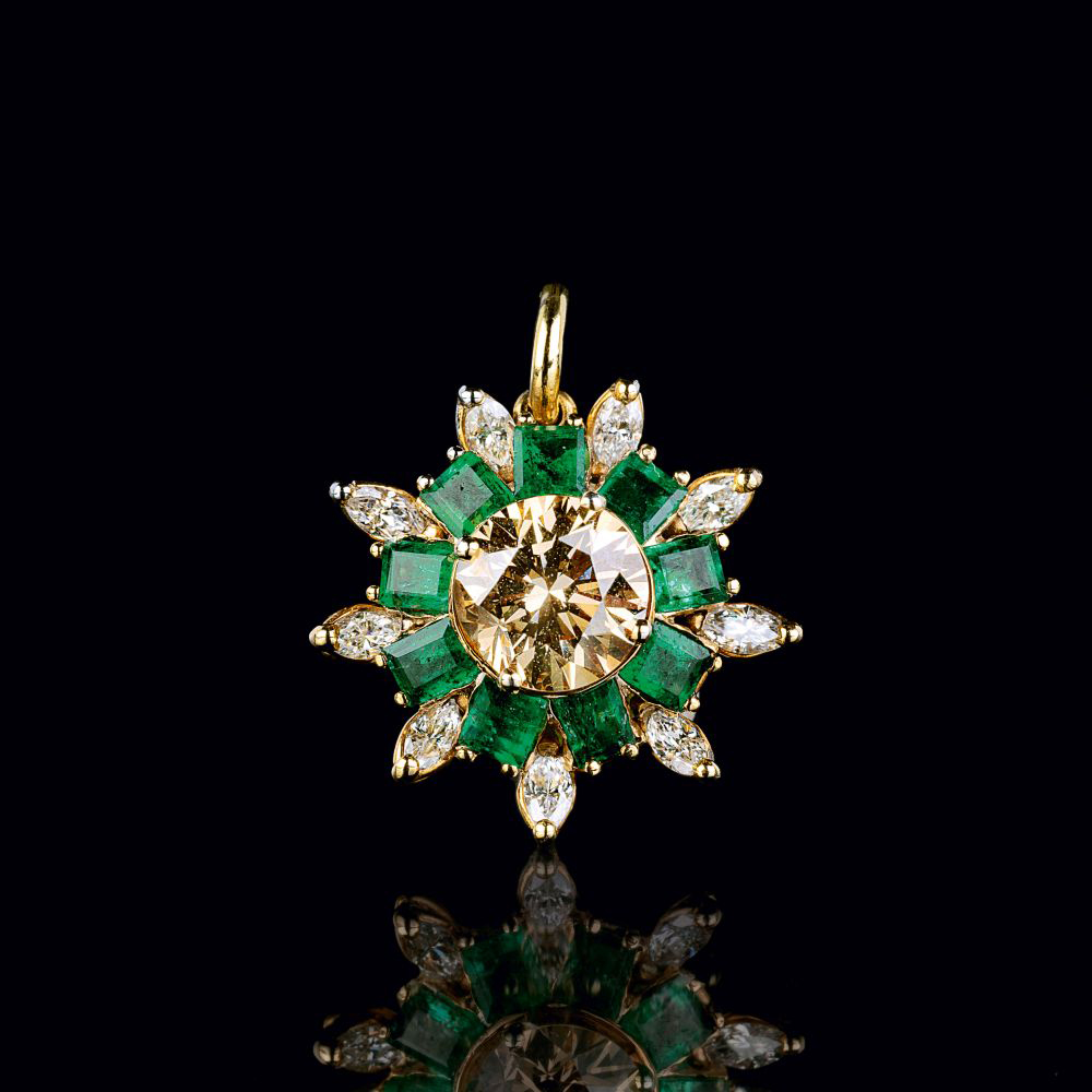 A Fancy Diamond Emerald Pendant.