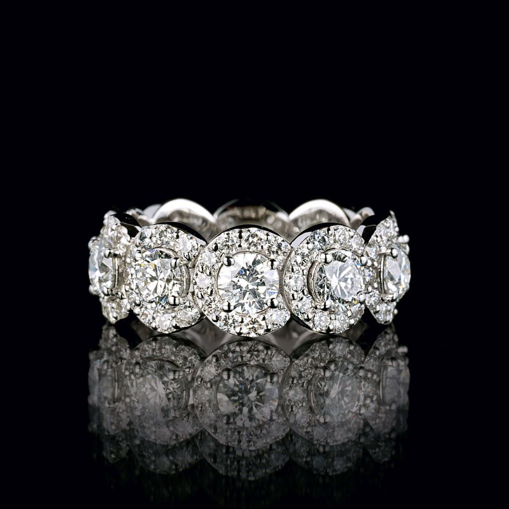 A Rare-White Diamond Ring with River Diamonds.