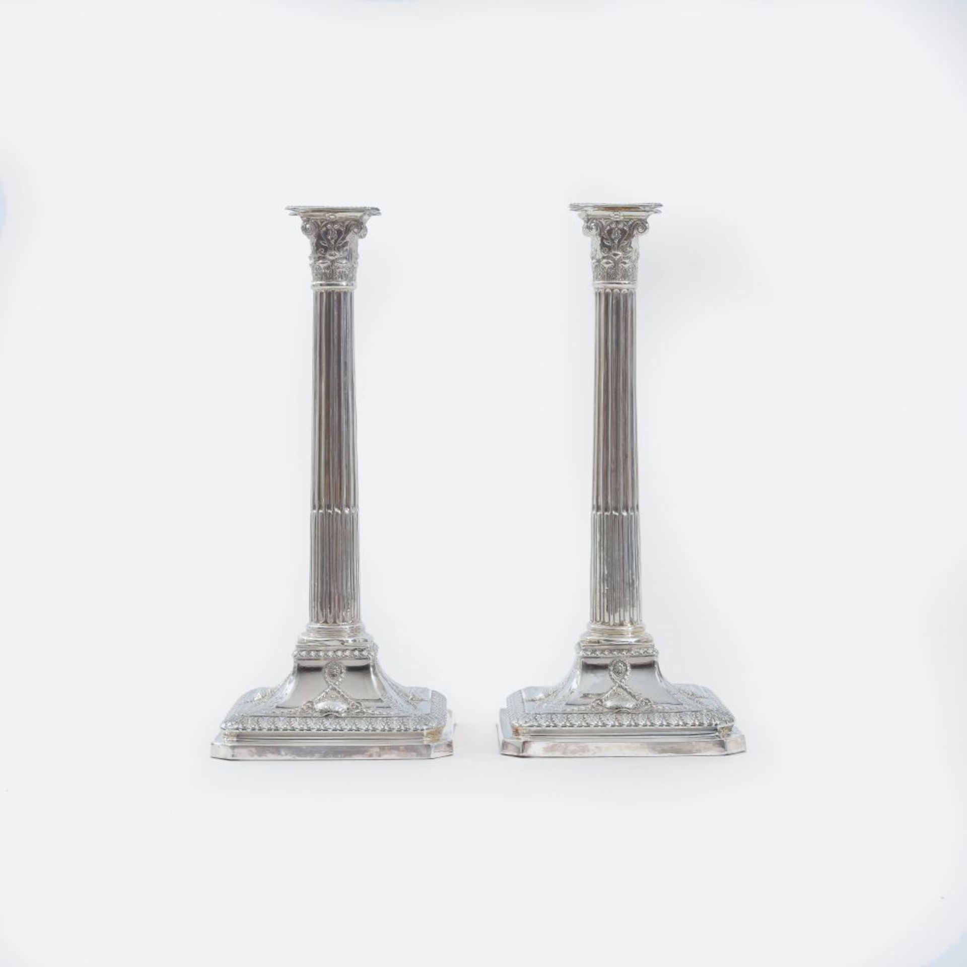 Winter, John Sheffield Master, active before 1773. A Pair of large George III Candleholders with Cor