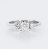 A Cushionshaped Cut Diamond Ring.