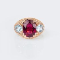 A Cocktailring with Red Tourmaline, Aquamarin and Diamonds.