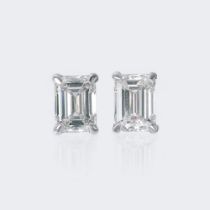 A Pair of Solitaire Diamond Earstuds in Emerald Cut.