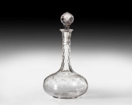 A CUT-GLASS DECANTER, EARLY 20TH CENTURY