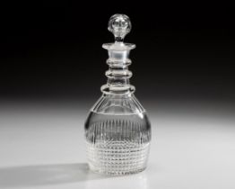 A CUT-GLASS DECANTER, 19TH CENTURY