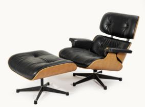 A LOUNGE CHAIR AND OTTOMAN, DESIGNED IN 1956 BY CHARLES AND RAY EAMES, MANUFACTURED BY VITRA