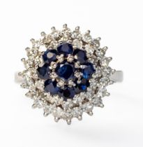 A SAPPHIRE AND DIAMOND RING