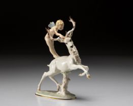 A HUTSCHENREUTHER PORCELAIN 'CHERUB AND ELK' FIGURINE BY C. WERNER, EARLY 20TH CENTURY