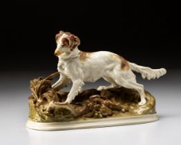 A NYMPHENBURG PORCELAIN 'IRISH SETTER' FIGURE AFTER PJ MENE