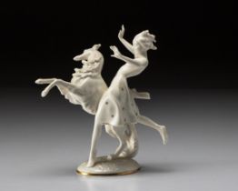 A HUTSCHENREUTHER PORCELAIN 'GIRL AND BORZOI' FIGURAL GROUP BY KARL TUTTER