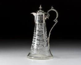 A CUT-GLASS CLARET JUG WITH SILVER-PLATE MOUNTS