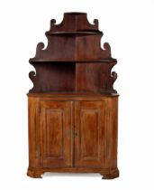 A CAPE TEAK CORNER CUPBOARD, 19TH CENTURY