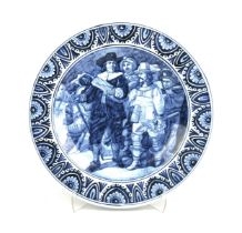 A DUTCH DELFT BLUE AND WHITE 'THE NIGHT WATCH' CHARGER