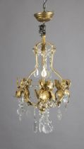 A GOLD-PAINTED AND GLASS THREE-LIGHT CHANDELIER