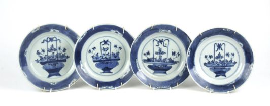 A SET OF FOUR CHINESE BLUE AND WHITE "FLOWER BASKET" PLATES, QING DYNASTY, 19TH CENTURY