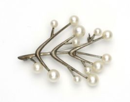 A SILVER AND PEARL BROOCH