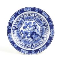 A BLUE AND WHITE DELFT PLATE