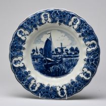 A DUTCH DELFT BLAUW CHARGER, 20TH CENTURY