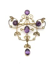 AN AMETHYST AND PEARL BROOCH, CIRCA 1900