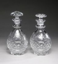 A NEAR PAIR OF "DAISY PATTERN" CRYSTAL DECANTERS