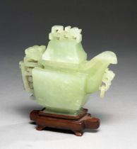 A CHINESE GREEN HARDSTONE ARCHAISTIC POURING VESSEL, "YI", REPUBLIC PERIOD, 1912 - 1949