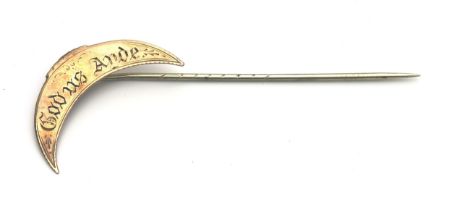 A GOLD TIE PIN