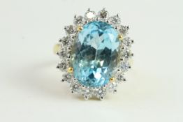 18YG Blue Topaz and Diamond Oval Cluster Ring. BlueT 14.28ct & D1.80ct