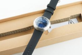 NOS IKEPOD AUTOMATIC WRISTWATCH W/ BOX & GUARANTEE REF. 2642, circular blue dial with applied silver