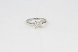 Fine 18ct white gold and cushion cut 1.87ct diamond solitaire ring. Set in white gold with a large