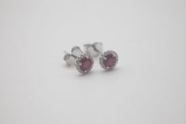 Fine 9ct White Gold Ruby and Diamond EarringsThey're 9ct White Gold set with Rubies and Diamonds.