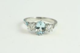 Platinum Claw-set Aqua & Diamond 3-stone Ring. A1.01ct & D0.50ct