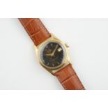 TUDOR OYSTERDATE GOLD PLATED RED DATE GILT WRISTWATCH REF. 7919 CIRCA 1958, circular black gilt dial