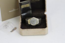 JAEGER LE COULTRE INTEGRATED BRACELET BOX AND PAPERS 1988, circular silver dial with baton hour