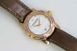 LADIES SAINT HONORE PARIS QUARTZ WRISTWATCH 36MM, Silver and mother of pearl dial with a diamond dot