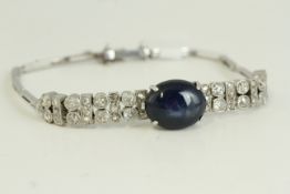 Antique Art Deco 18ct white gold sapphire and diamond bracelet. Set with a large 10.3 carat cabochon