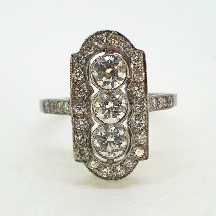 Art Deco style plaque ring, set with an estimated 1.50 carats in total. The 3 central diamonds are