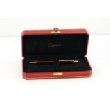 CARTIER BALLPOINT WITH BOX, red lacquer case, gold detail, with Cartier box, with presentation