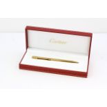 CARTIER GOLD PLATED BALL POINT PEN, GOLD PLATED CASE, TWIST TOP, WITH BOX AND PAPERS