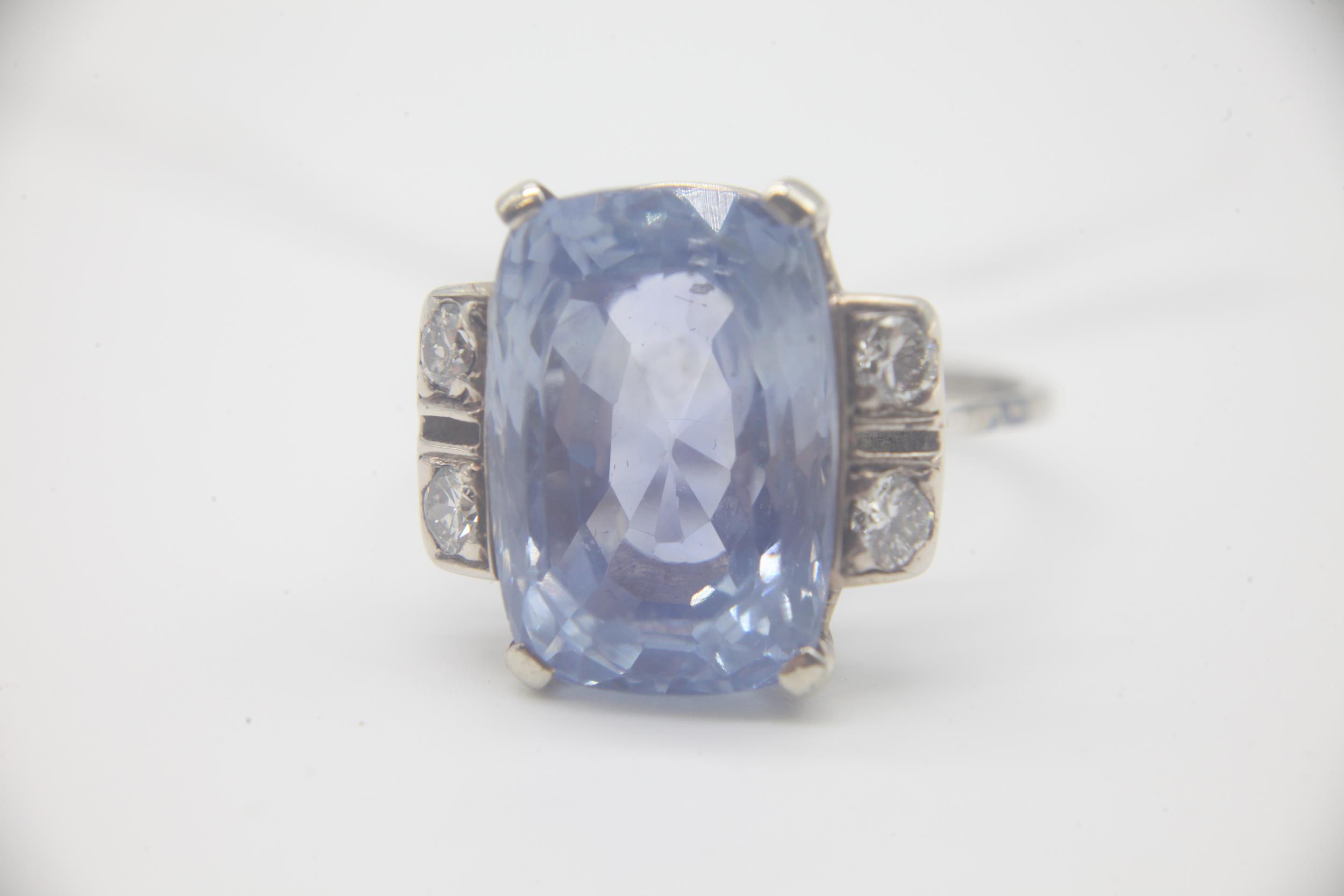 Natural 15.76 carat cushion cut ceylon sapphire, set in a white metal shank with two diamonds either - Image 5 of 6