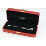 CARTIER ROADSTER BALLPOINT PEN WITH BOX, black tapering design with cabochon set top, with Cartier