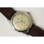 VINTAGE TUDOR OYSTER DEVON CIRCA 1947, circular silver patina dial with arabic numeral hour markers,