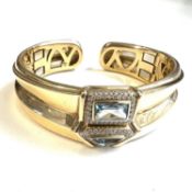 Fine designer CORUM heavy diamond and aquamarine 18 CT gold bangle. Marked CORUM 750. Encrusted with
