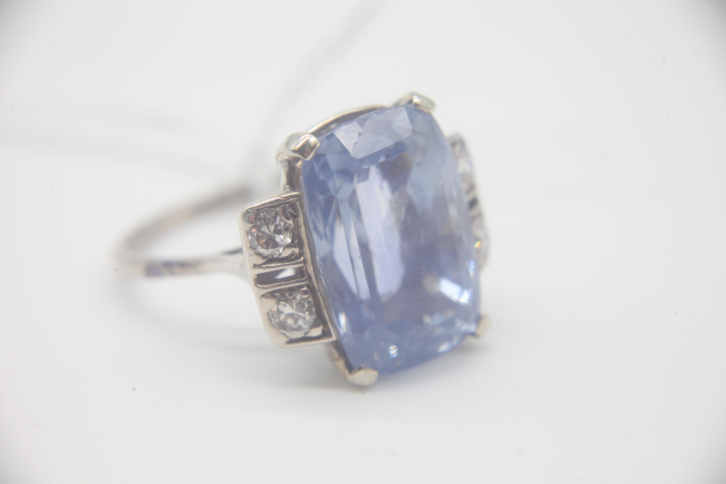 Natural 15.76 carat cushion cut ceylon sapphire, set in a white metal shank with two diamonds either - Image 4 of 6