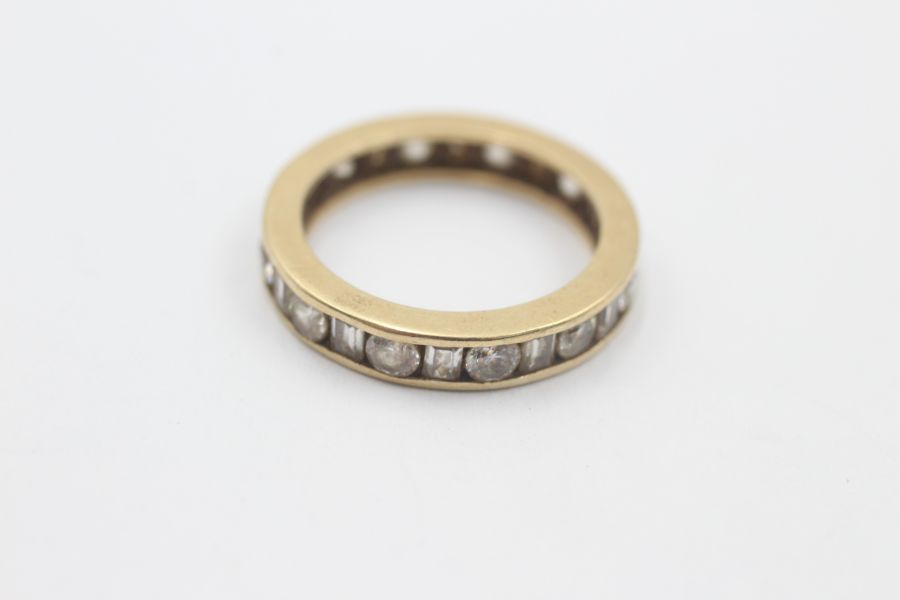 9ct gold clear gemstone mixed cut channel setting eternity ring (3.5g)