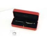 DIABOLO DE CARTIER BALL POINT PEN WITH BOX AND PAPERS, black case, cabochon top, with box and