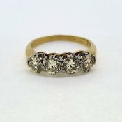 A yellow gold diamond 4 stone ring, clawset. Tested 18 carat Diamond total estimated 1.25 carat Ring