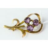 Fine 9ct gold amethyst brooch . Set with amethysts and pearls . Measureâ€™s 4.5cm in length . Weighs